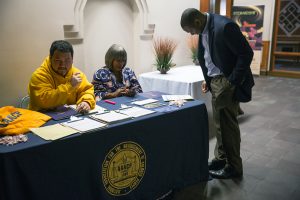 People visit a NAACP booth before a town hall meeting sponsored by Georgia Charter Schools Association and GeorgiaCAN at Ebenezer Baptist Church on Friday, Jan. 13, 2017, in Atlanta. (Branden Camp/AP Images for Georgia Charter Schools Association)