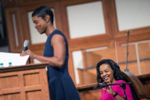 Terra Walker, director of school operations KIPP STRIVE Primary School, right, smiles during a town hall meeting sponsored by Georgia Charter Schools Association and GeorgiaCAN at Ebenezer Baptist Church on Friday, Jan. 13, 2017, in Atlanta. (Branden Camp/AP Images for Georgia Charter Schools Association)