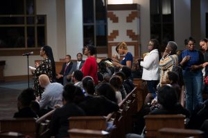 People line up to ask the panelist questions during a town hall meeting sponsored by Georgia Charter Schools Association and GeorgiaCAN at Ebenezer Baptist Church on Friday, Jan. 13, 2017, in Atlanta. (Branden Camp/AP Images for Georgia Charter Schools Association)