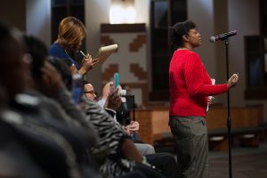 People line up to ask questions during a town hall meeting sponsored by Georgia Charter Schools Association and GeorgiaCAN at Ebenezer Baptist Church on Friday, Jan. 13, 2017, in Atlanta. (Branden Camp/AP Images for Georgia Charter Schools Association)