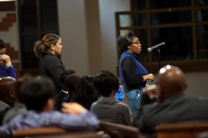 People line up to ask questions during a town hall meeting sponsored by Georgia Charter Schools Association and GeorgiaCAN at Ebenezer Baptist Church on Friday, Jan. 13, 2017, in Atlanta. (Branden Camp/AP Images for Georgia Charter Schools Association)