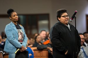 People line up to ask questions during a town hall meeting sponsored by Georgia Charter Schools Association and GeorgiaCAN at Ebenezer Baptist Church on Friday, Jan. 13, 2017, in Atlanta. (Branden Camp/AP Images for Georgia Charter Schools Association)