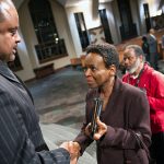 Journalist Roland S. Martin shakes a woman's hand following a town hall meeting sponsored by Georgia Charter Schools Association and GeorgiaCAN at Ebenezer Baptist Church on Friday, Jan. 13, 2017, in Atlanta. (Branden Camp/AP Images for Georgia Charter Schools Association)