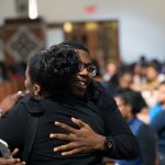 People embrace before a town hall meeting sponsored by Georgia Charter Schools Association and GeorgiaCAN at Ebenezer Baptist Church on Friday, Jan. 13, 2017, in Atlanta. (Branden Camp/AP Images for Georgia Charter Schools Association)