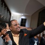 Journalist Roland S. Martin takes a photo with a guest following a town hall meeting sponsored by Georgia Charter Schools Association and GeorgiaCAN at Ebenezer Baptist Church on Friday, Jan. 13, 2017, in Atlanta. (Branden Camp/AP Images for Georgia Charter Schools Association)