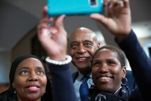 Kevin Chavous, national education expert, takes a photo with guest following a town hall meeting sponsored by Georgia Charter Schools Association and GeorgiaCAN at Ebenezer Baptist Church on Friday, Jan. 13, 2017, in Atlanta. (Branden Camp/AP Images for Georgia Charter Schools Association)